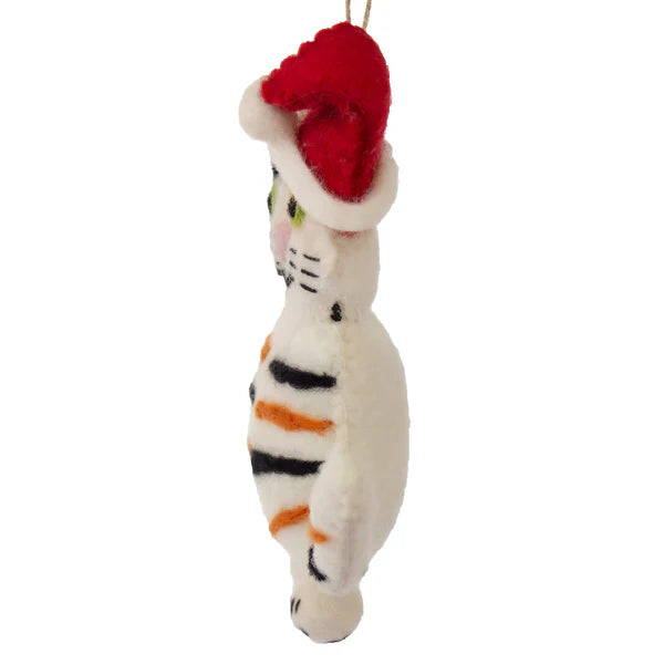 This Global Groove Life, handmade, ethical, fair trade, eco-friendly, sustainable, 100% New Zealand Wool, black and white, orange and red, felt kitty ornament with Santa hat was created by artisans in Kathmandu Nepal and will be a beautiful addition to your Christmas tree this holiday season.