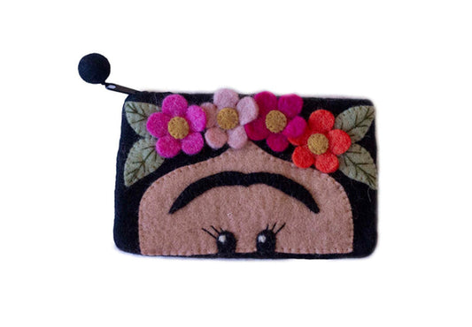 This Global Groove Life, handmade, ethical, fair trade, eco-friendly, sustainable, black felt zipper coin pouch was created by artisans in Kathmandu Nepal and is adorned with an adorable Frida and flower motif.
