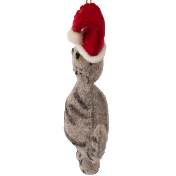 This Global Groove Life, handmade, ethical, fair trade, eco-friendly, sustainable, 100% New Zealand Wool, grey felt kitty ornament with red Santa hat was created by artisans in Kathmandu Nepal and will be a beautiful addition to your Christmas tree this holiday season.