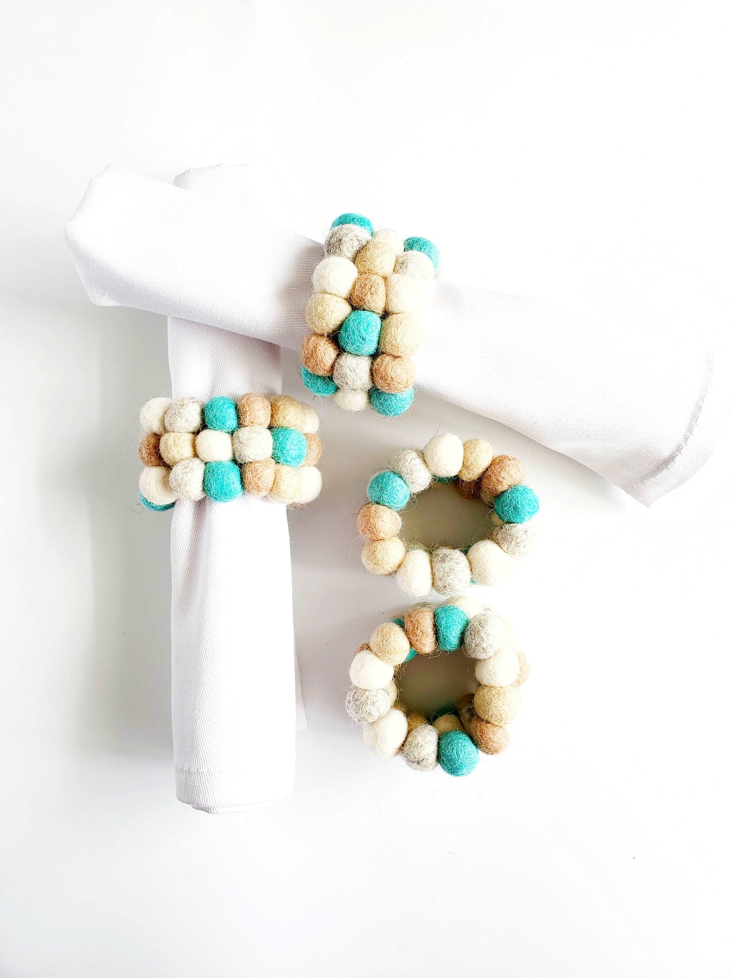 This Global Groove Life, handmade, ethical, fair trade, eco-friendly, sustainable, felt Kokopelli Napkin Ring set was created by artisans in Kathmandu Nepal and will bring colorful warmth and functionality to your table top.