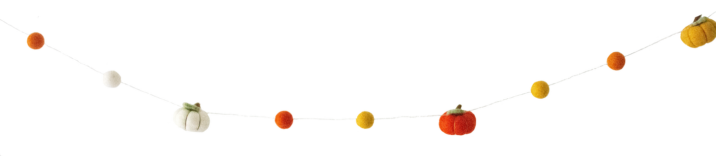 This Global Groove Life, handmade, ethical, fair trade, eco-friendly, sustainable, 100% New Zealand Wool felt, orange, white and yellow, Pumpkin Spice, pumpkin and pom pom garland ,was created by artisans in Kathmandu Nepal and will bring beautiful color, warmth and fun to your home this Autumn Season.
