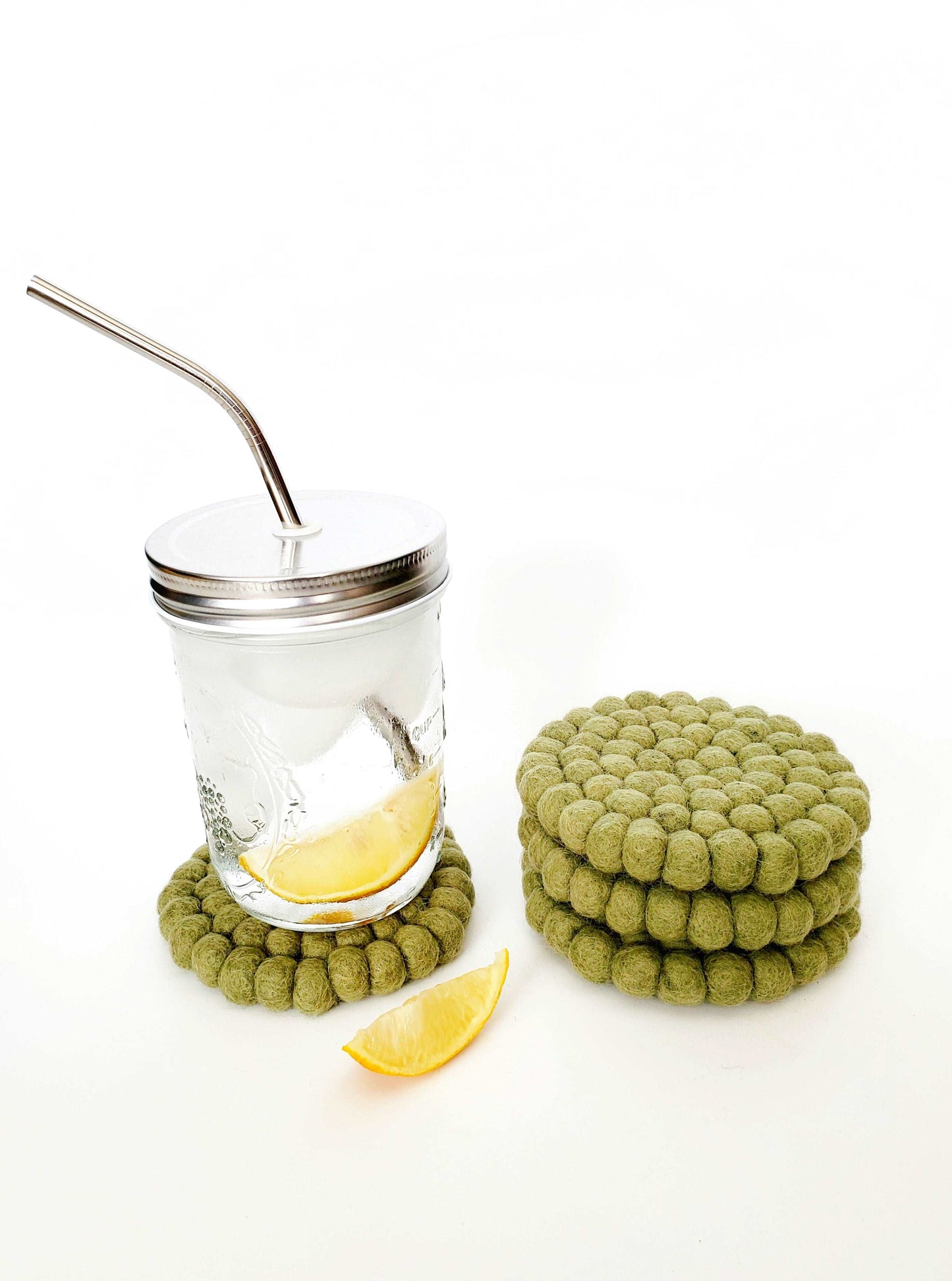 This Global Groove Life, handmade, ethical, fair trade, eco-friendly, sustainable, felt Sage coaster set was created by artisans in Kathmandu Nepal and will bring colorful warmth and functionality to your table top.