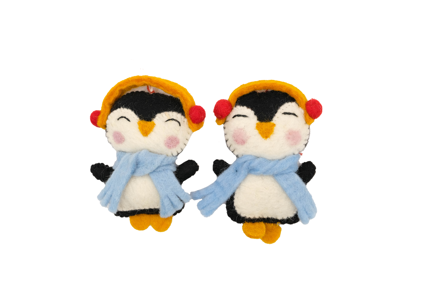 This Global Groove Life, handmade, ethical, fair trade, eco-friendly, sustainable, felt penguin ornament set was created by artisans in Kathmandu Nepal and will bring colorful warmth and fun to your Christmas tree this season.