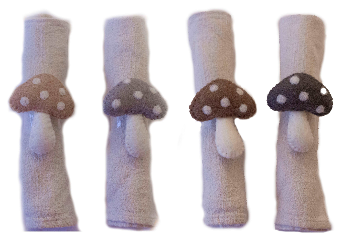 This Global Groove Life, handmade, ethical, fair trade, eco-friendly, sustainable, felt Mushroom Napkin Ring set was created by artisans in Kathmandu Nepal and will bring colorful warmth and functionality to your table top.