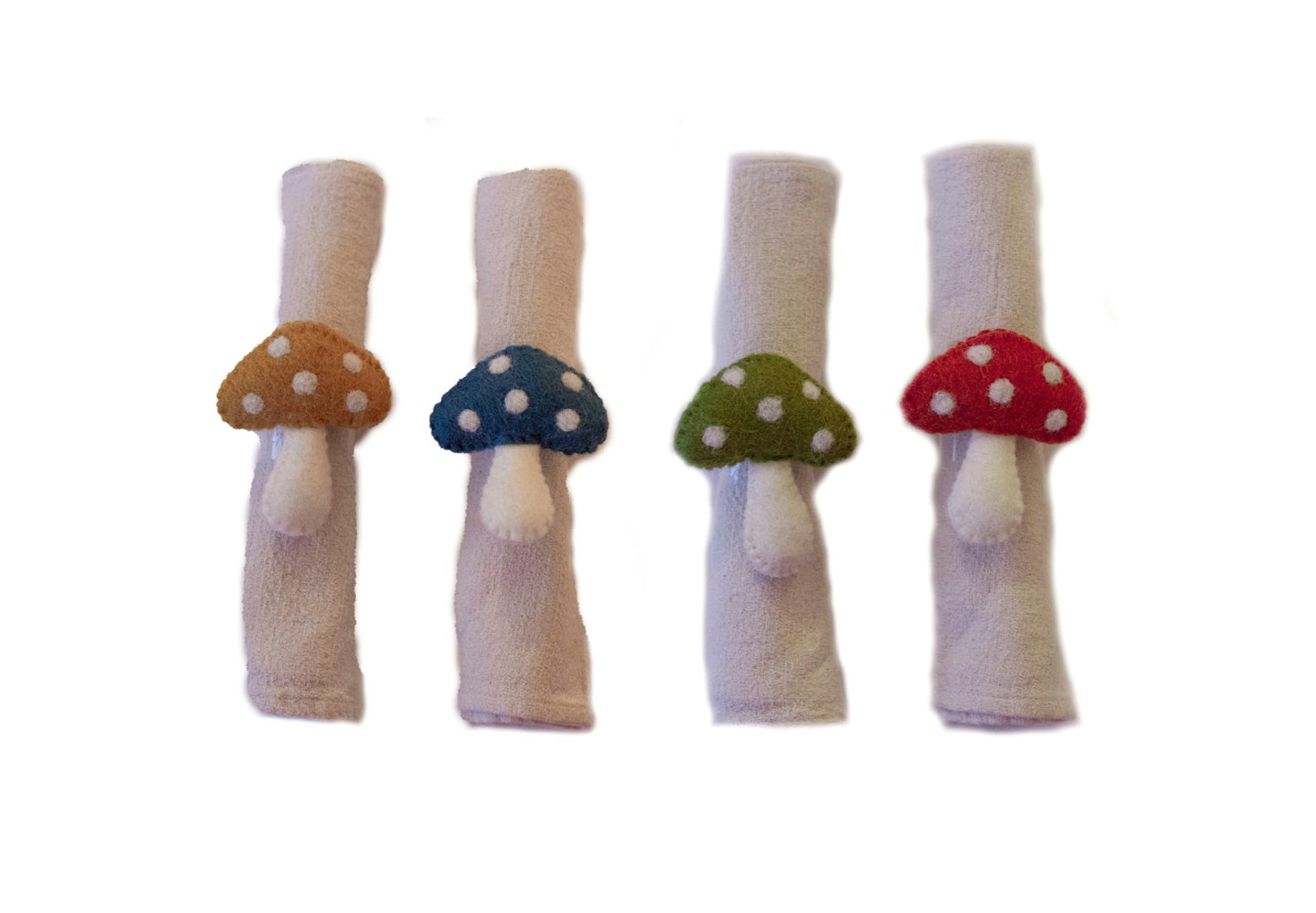 This Global Groove Life, handmade, ethical, fair trade, eco-friendly, sustainable, felt mustard, blue, green and orange Mushroom Napkin Set set was created by artisans in Kathmandu Nepal and will bring colorful warmth and functionality to your table top.