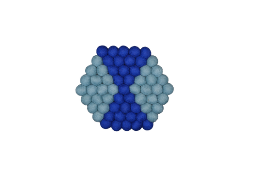 This Global Groove Life, handmade, ethical, fair trade, eco-friendly, sustainable, blue 100% New Zealand hexagonal wool felt trivet was created by artisans in Kathmandu Nepal and will bring colorful warmth and functionality to your table top.
