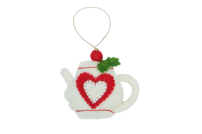 This Global Groove Life, handmade, ethical, fair trade, eco-friendly, sustainable, felt, white teapot ornament with red heart and holly motif, was created by artisans in Kathmandu Nepal and will be a beautiful addition to your Christmas tree this holiday season.
