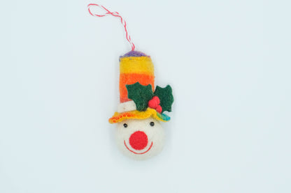 This Global Groove Life, handmade, ethical, fair trade, eco-friendly, sustainable, rainbow top hat snow man ornament was created by artisans in Kathmandu Nepal and will bring colorful warmth and fun to your Christmas tree.