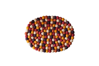 This Global Groove Life, handmade, ethical, fair trade, eco-friendly, sustainable, harvest colored 100% New Zealand wool felt, Harvest Casserole trivet was created by artisans in Kathmandu Nepal and will bring colorful Fall warmth and functionality to your table top this Thanksgiving.