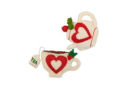 This Global Groove Life, handmade, ethical, fair trade, eco-friendly, sustainable, felt, red and white heart teapot and teacup with holly ornament set was created by artisans in Kathmandu Nepal and will bring colorful warmth and fun to your Christmas tree this season.