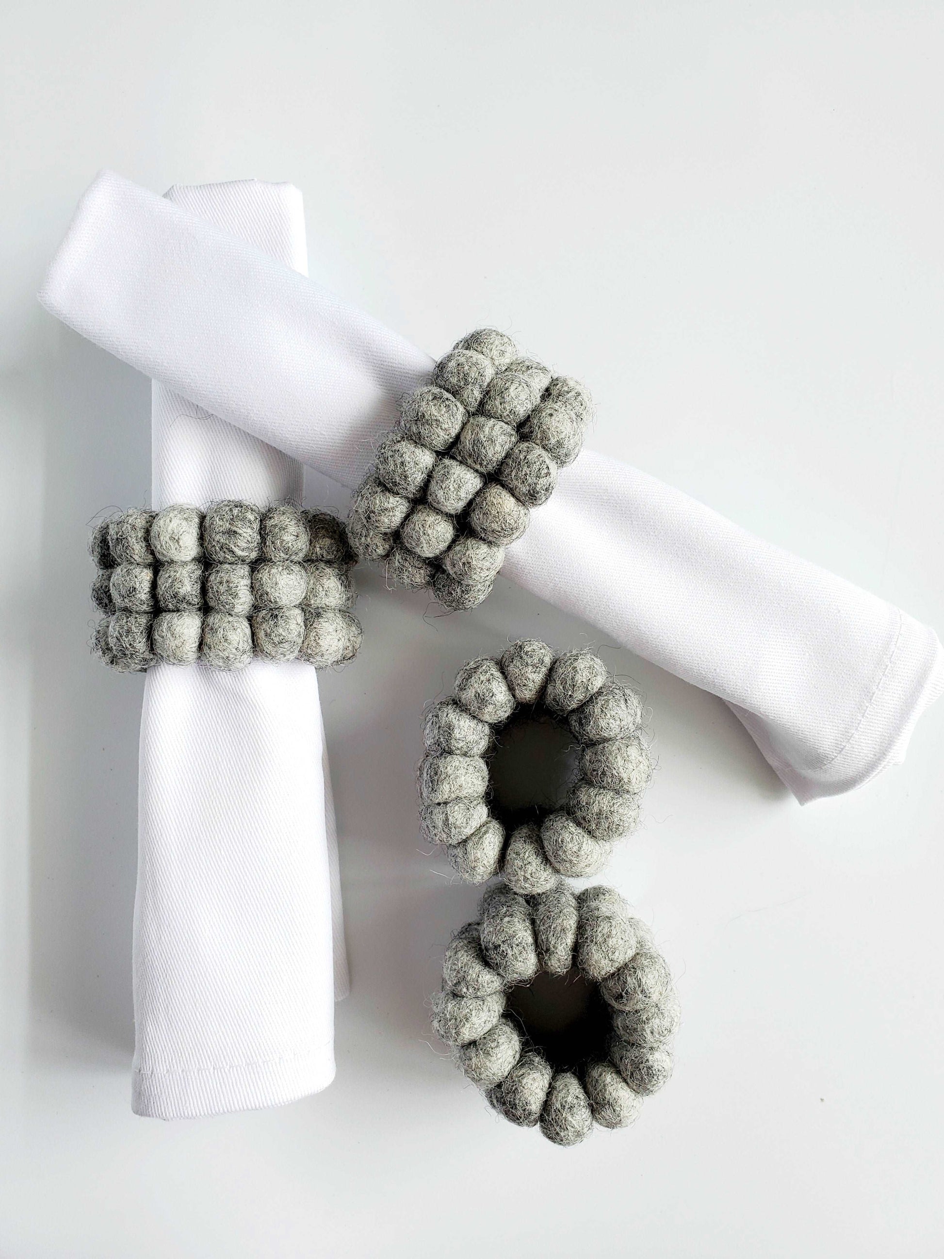 This Global Groove Life, handmade, ethical, fair trade, eco-friendly, sustainable, felt Heather Grey Napkin Ring set was created by artisans in Kathmandu Nepal and will bring colorful warmth and functionality to your table top.