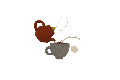 This Global Groove Life, handmade, ethical, fair trade, eco-friendly, sustainable, New Zealand wool felt, grey, blue, cinnamon & green heart teapot and teacup ornament set was created by artisans in Kathmandu Nepal and will bring colorful warmth and fun to your Christmas tree this season.