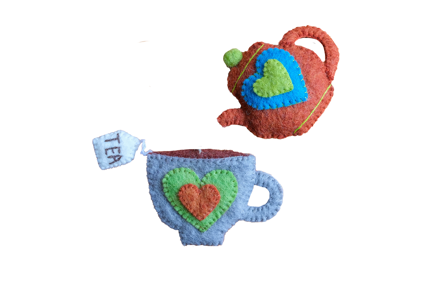 This Global Groove Life, handmade, ethical, fair trade, eco-friendly, sustainable, New Zealand wool felt, grey, blue, cinnamon & green heart teapot and teacup ornament set was created by artisans in Kathmandu Nepal and will bring colorful warmth and fun to your Christmas tree this season.