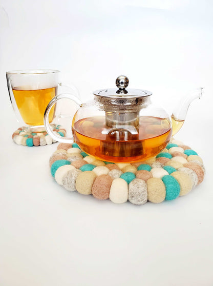 This Global Groove Life, handmade, ethical, fair trade, eco-friendly, sustainable, Kokopelli felt trivet was created by artisans in Kathmandu Nepal and will bring warmth and functionality to your table top.