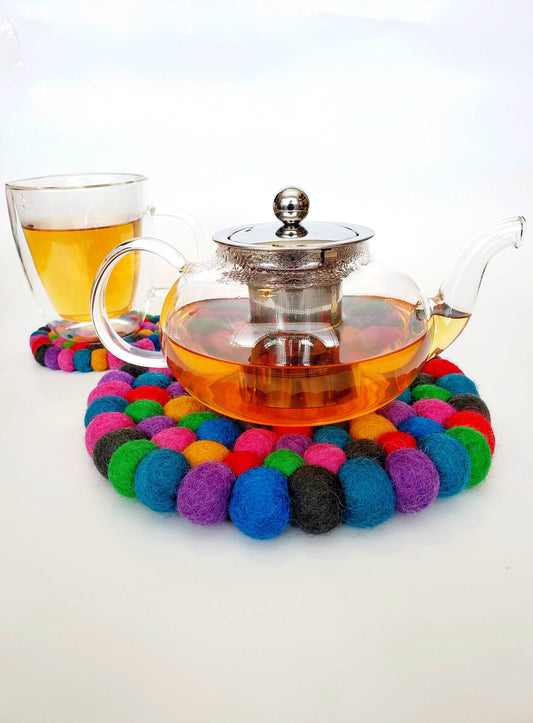 This Global Groove Life, handmade, ethical, fair trade, eco-friendly, sustainable, Kaleidoscope felt trivet was created by artisans in Kathmandu Nepal and will bring warmth and functionality to your table top.