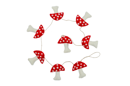 This Global Groove Life, handmade, ethical, fair trade, eco-friendly, sustainable, felt, purple, red, pink and white felt mushroom garland was created by artisans in Kathmandu Nepal and will bring beautiful color, warmth and fun to your home.