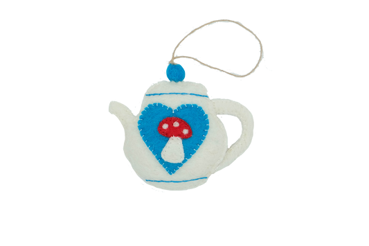 This Global Groove Life, handmade, ethical, fair trade, eco-friendly, sustainable, felt, teapot ornament with red mushroom and blue heart motif, was created by artisans in Kathmandu Nepal and will be a beautiful addition to your Christmas tree this holiday season.