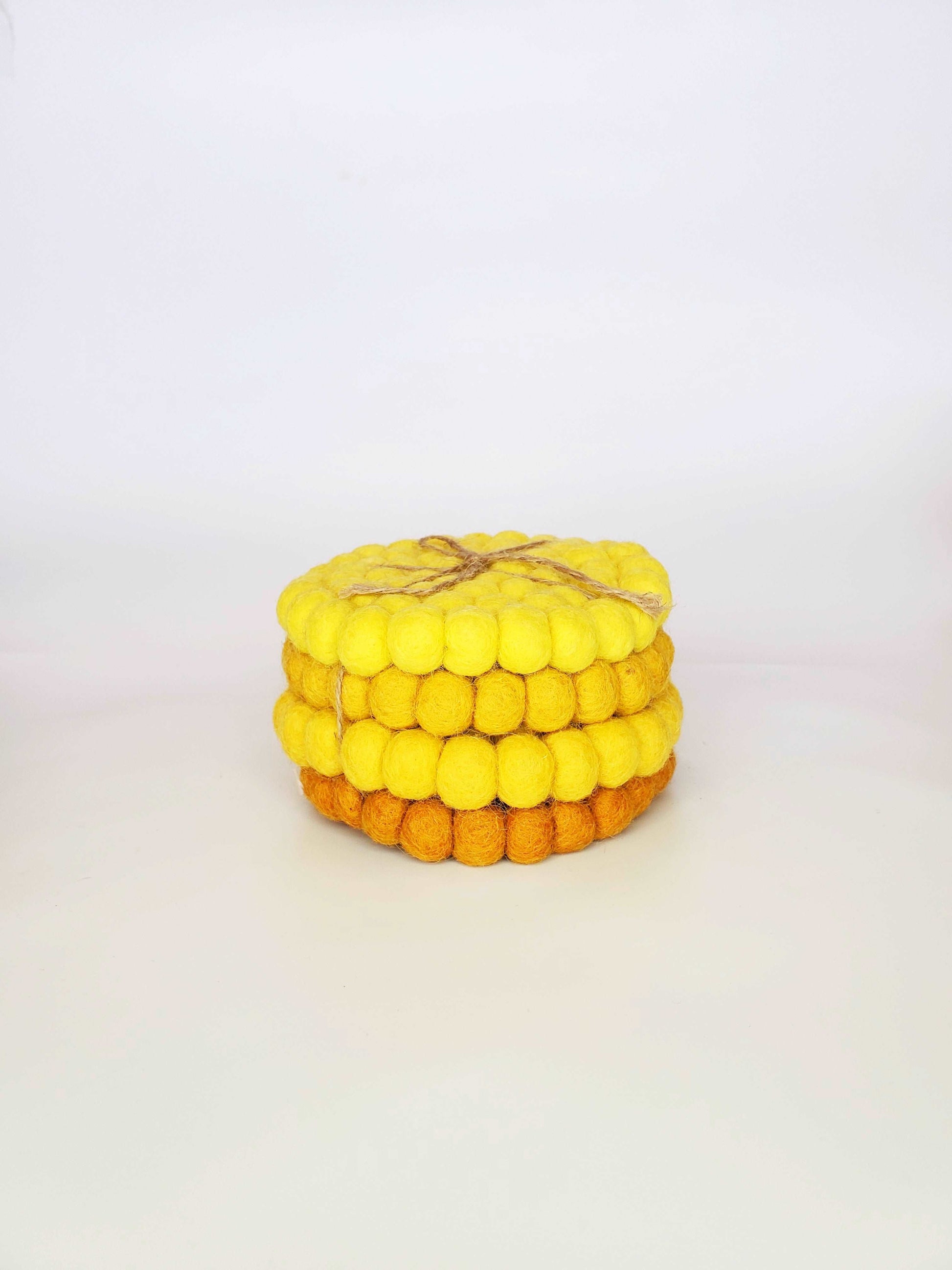Handmade Mustard Tonal Felt Pom-Pom Coasters