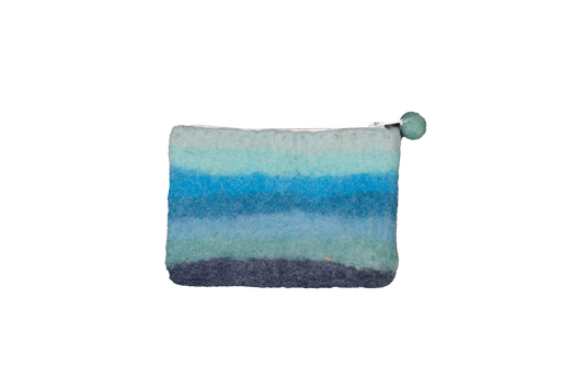This Global Groove Life, handmade, ethical, fair trade, eco-friendly, sustainable, ocean blue colored, New Zealand wool zipper coin purse was created by artisans in Kathmandu Nepal and is adorned with stripes and a pom pom zipper pull.