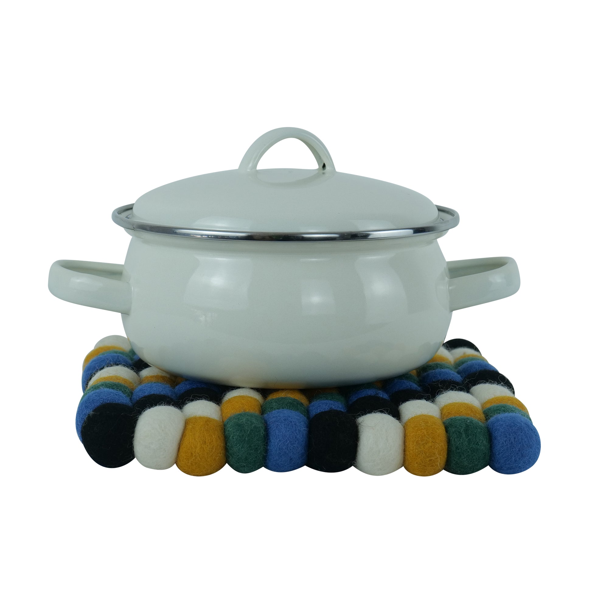 This Global Groove Life, handmade, ethical, fair trade, eco-friendly, sustainable, black, yellow, green & white 100% New Zealand wool felt Moroccan inspired trivet was created by artisans in Kathmandu Nepal and will bring colorful warmth and functionality to your table top.
