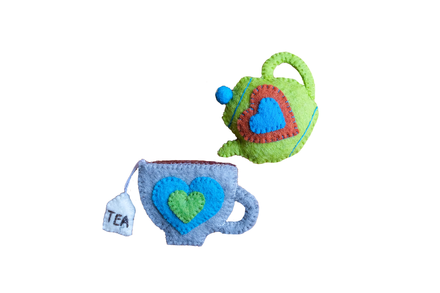 This Global Groove Life, handmade, ethical, fair trade, eco-friendly, sustainable, New Zealand wool felt, grey, blue & matcha green heart teapot and teacup ornament set was created by artisans in Kathmandu Nepal and will bring colorful warmth and fun to your Christmas tree this season.