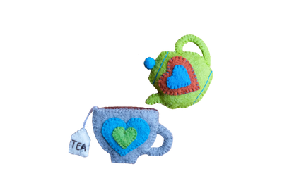 This Global Groove Life, handmade, ethical, fair trade, eco-friendly, sustainable, New Zealand wool felt, grey, blue & matcha green heart teapot and teacup ornament set was created by artisans in Kathmandu Nepal and will bring colorful warmth and fun to your Christmas tree this season.