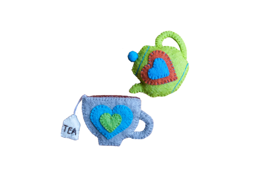 This Global Groove Life, handmade, ethical, fair trade, eco-friendly, sustainable, New Zealand wool felt, grey, blue & matcha green heart teapot and teacup ornament set was created by artisans in Kathmandu Nepal and will bring colorful warmth and fun to your Christmas tree this season.