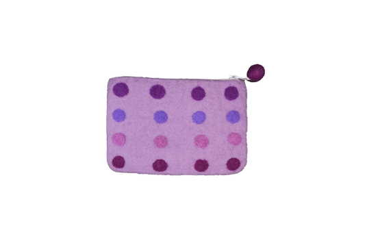 This Global Groove Life, handmade, ethical, fair trade, eco-friendly, sustainable, purple colored, New Zealand wool zipper coin purse was created by artisans in Kathmandu Nepal and is adorned with a polka dot motif and a pom pom zipper pull.