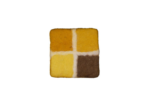 This Global Groove Life, handmade, ethical, fair trade, eco-friendly, sustainable, New Zealand wool felt, Honey yellow coaster set, was created by artisans in Kathmandu Nepal and will bring colorful warmth and functionality to your table top.