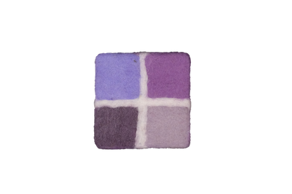 This Global Groove Life, handmade, ethical, fair trade, eco-friendly, sustainable, New Zealand wool felt, twilight, lavender & purple coaster set, was created by artisans in Kathmandu Nepal and will bring colorful warmth and functionality to your table top.