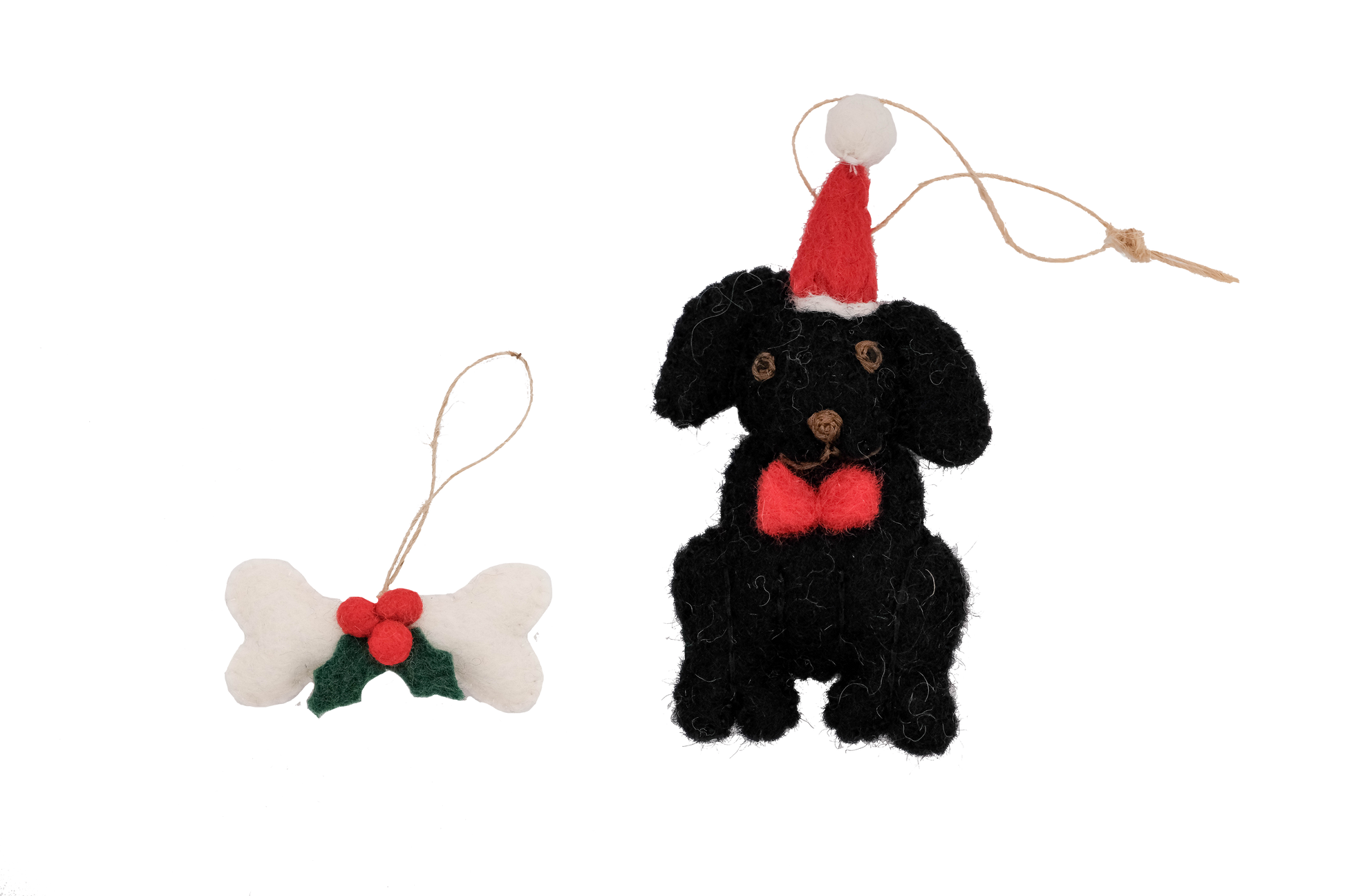 This Global Groove Life, handmade, ethical, fair trade, eco-friendly, sustainable, Black Labrador Dog with white, green and red bone treat ornament set was created by artisans in Kathmandu Nepal and will be a beautiful addition to your Christmas tree this holiday season.