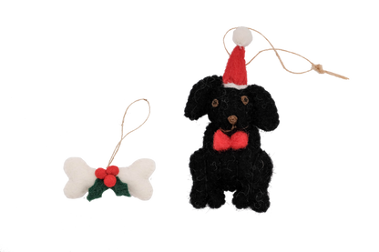 This Global Groove Life, handmade, ethical, fair trade, eco-friendly, sustainable, Black Labrador Dog with white, green and red bone treat ornament set was created by artisans in Kathmandu Nepal and will be a beautiful addition to your Christmas tree this holiday season.
