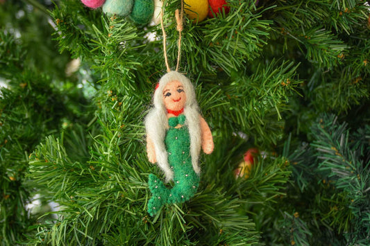 This Global Groove Life, handmade, ethical, fair trade, eco-friendly, sustainable, green, white and red, felt Mermaid with Starfish ornament set was created by artisans in Kathmandu Nepal and will be a beautiful addition to your Christmas tree this holiday season.