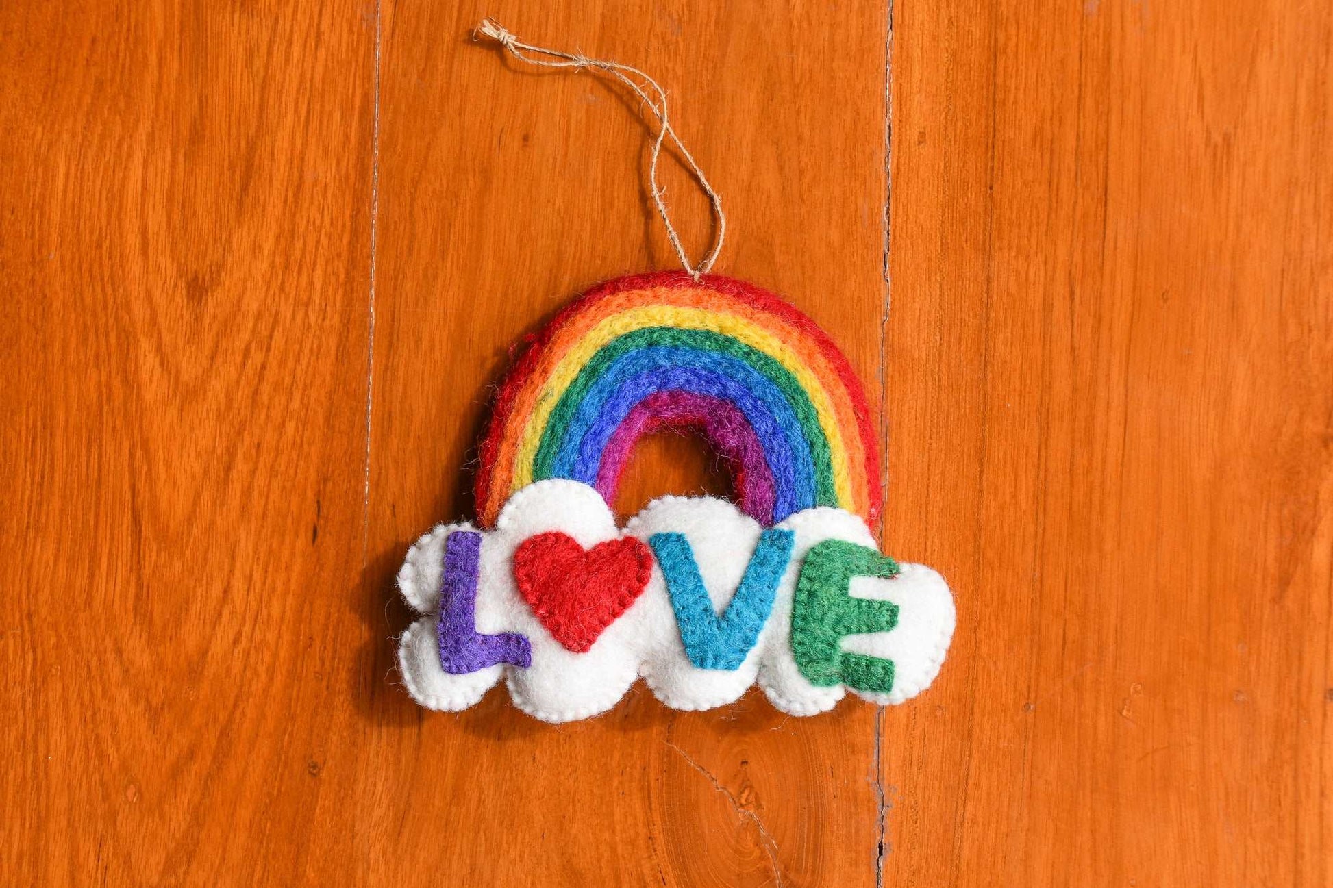 This Global Groove Life, handmade, ethical, fair trade, eco-friendly, sustainable, felt, Rainbow Love Cloud ornament, was created by artisans in Kathmandu Nepal and will be a beautiful addition to your Christmas tree this holiday season.