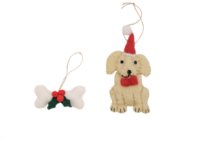 This Global Groove Life, handmade, ethical, fair trade, eco-friendly, sustainable, Golden Labrador Santa Dog with white, green and red bone treat ornament set was created by artisans in Kathmandu Nepal and will be a beautiful addition to your Christmas tree this holiday season.
