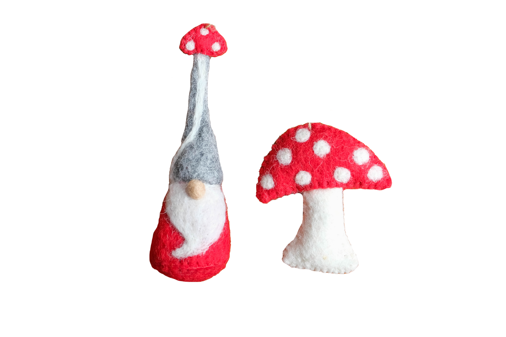 This Global Groove Life, handmade, ethical, fair trade, eco-friendly, sustainable, felt, red mushroom and mushroom hat gnome ornament set was created by artisans in Kathmandu Nepal and will be a beautiful and fun addition to your Christmas tree this holiday season.