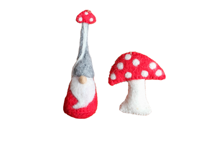 This Global Groove Life, handmade, ethical, fair trade, eco-friendly, sustainable, felt, red mushroom and mushroom hat gnome ornament set was created by artisans in Kathmandu Nepal and will be a beautiful and fun addition to your Christmas tree this holiday season.
