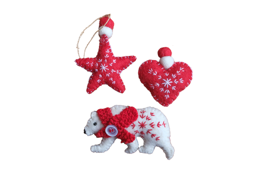 This Global Groove Life, handmade, ethical, fair trade, eco-friendly, sustainable, red and white, Polar Bear, heart and star felt ornament set was created by artisans in Kathmandu Nepal and will be a beautiful and fun addition to your Christmas tree this holiday season.