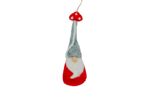 This Global Groove Life, handmade, ethical, fair trade, eco-friendly, sustainable, felt, red gnome ornament with mushroom motif, was created by artisans in Kathmandu Nepal and will be a beautiful addition to your Christmas tree this holiday season.