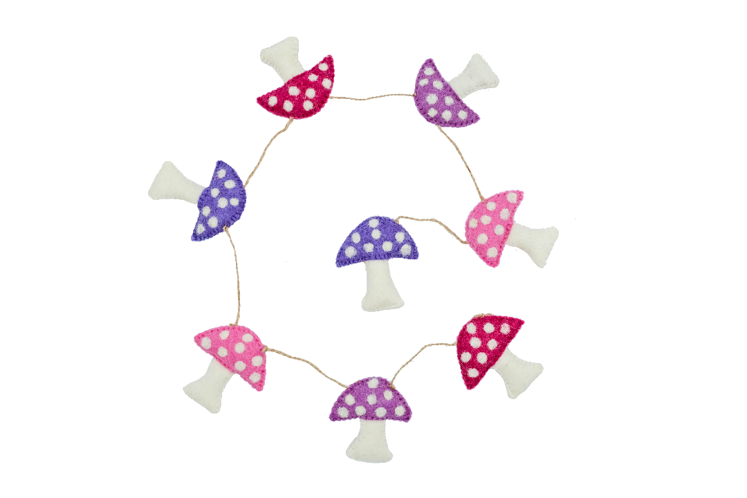 This Global Groove Life, handmade, ethical, fair trade, eco-friendly, sustainable, felt, purple, red, pink and white felt mushroom garland was created by artisans in Kathmandu Nepal and will bring beautiful warmth, color and fun to your home.