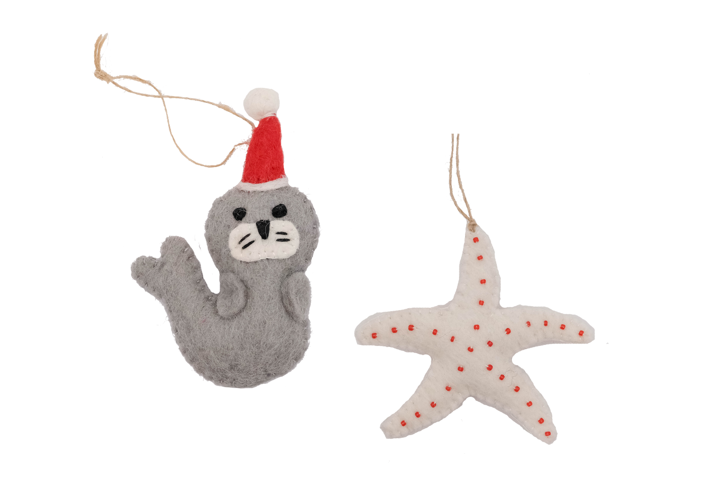 This Global Groove Life, handmade, ethical, fair trade, eco-friendly, sustainable, grey, white and red, felt Seal Santa with Starfish ornament set was created by artisans in Kathmandu Nepal and will be a beautiful addition to your Christmas tree this holiday season.