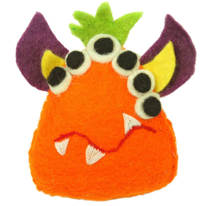 This Global Groove Life, handmade, ethical, fair trade, eco-friendly, sustainable, orange, green and purple, tooth fairy monster, was created by artisans in Kathmandu Nepal and is adorned with an adorable monster motif.