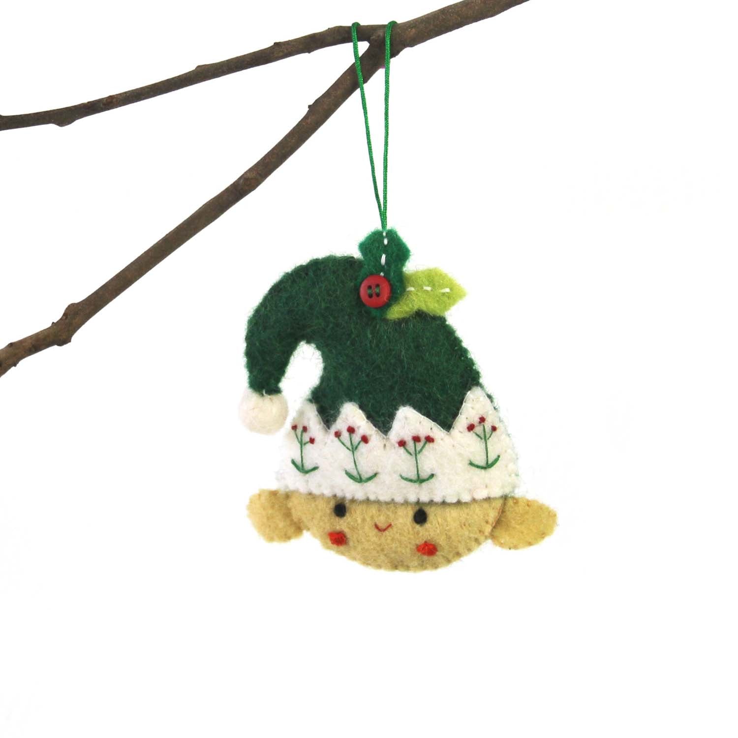 This Global Groove Life, handmade, ethical, fair trade, eco-friendly, sustainable, elf with green hat felt ornament was created by artisans in Kathmandu Nepal and will be a beautiful addition to your Christmas tree this holiday season.