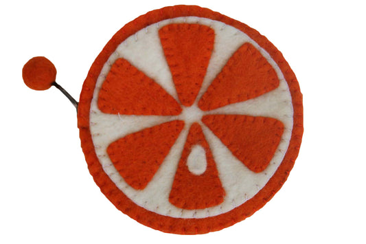 This Global Groove Life, handmade, ethical, fair trade, eco-friendly, sustainable, 100% New Zealand wool, orange & white colored, Orange Slice, zipper coin purse was created by artisans in Kathmandu Nepal