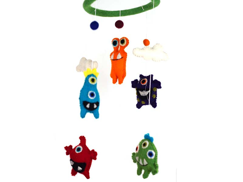 This Global Groove Life, handmade, ethical, fair trade, eco-friendly, sustainable, Monsters felt mobile, with, red, orange, purple, green and blue monsters, was created by artisans in Kathmandu Nepal and will be a beautiful and fun addition to your home.