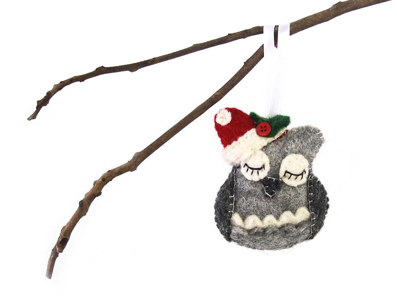 This Global Groove Life, handmade, ethical, fair trade, eco-friendly, sustainable, grey felt owl with Santa hat  ornament was created by artisans in Kathmandu Nepal and will be a beautiful addition to your Christmas tree this holiday season.