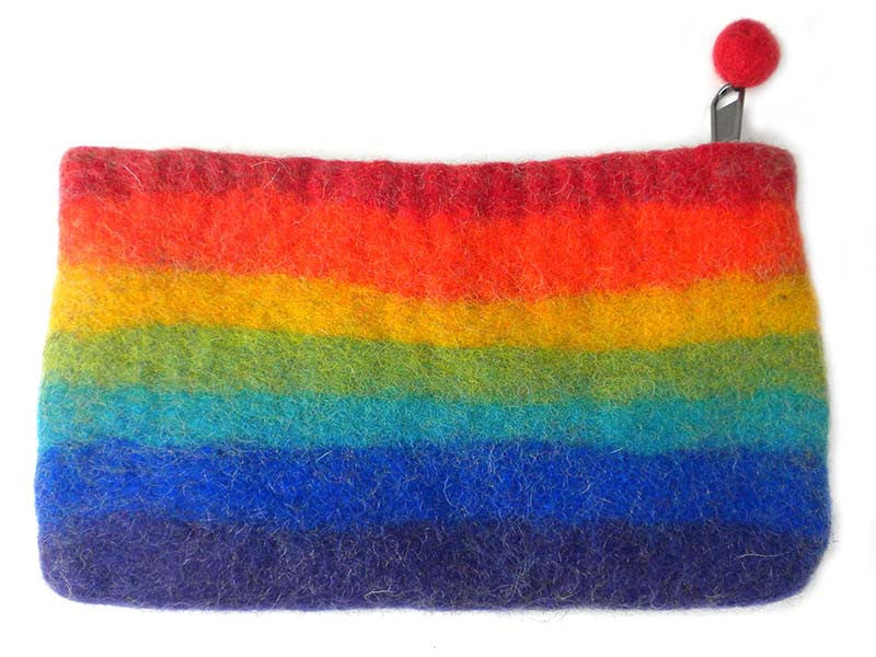 This Global Groove Life, handmade, ethical, fair trade, eco-friendly, sustainable, rainbow felt clutch was created by artisans in Kathmandu Nepal and is adorned with a brilliant prismatic motif.