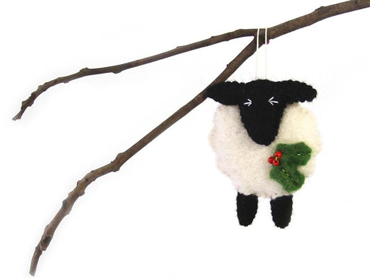 This Global Groove Life, handmade, ethical, fair trade, eco-friendly, sustainable, black and white felt sheep ornament was created by artisans in Kathmandu Nepal and will be a beautiful addition to your Christmas tree this holiday season.
