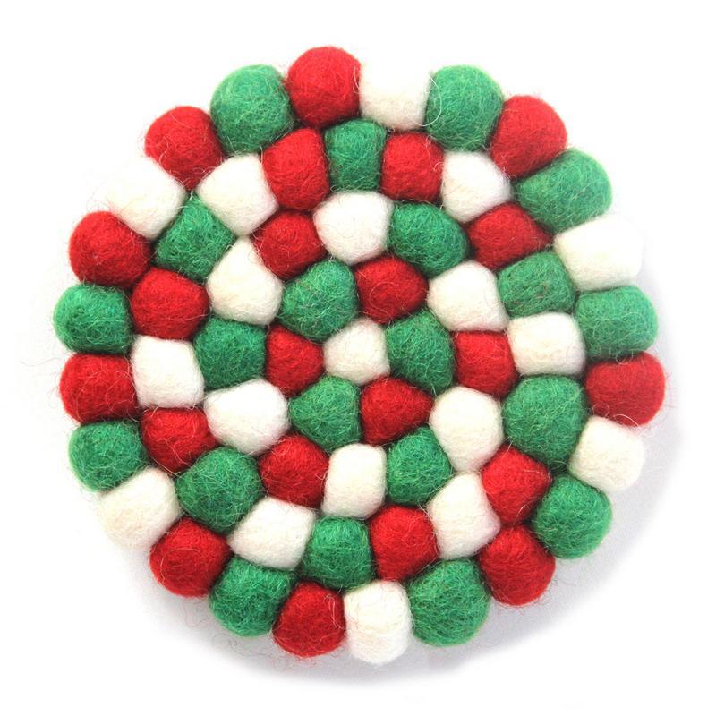 This Global Groove Life, handmade, ethical, fair trade, eco-friendly, sustainable, felt Classic Xmas, red, white and green coaster set was created by artisans in Kathmandu Nepal and will bring colorful warmth and functionality to your table top.