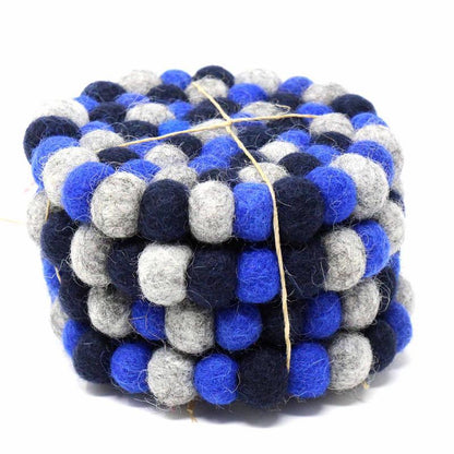 This Global Groove Life, handmade, ethical, fair trade, eco-friendly, sustainable, felt Chakra Dark Blues coaster set was created by artisans in Kathmandu Nepal and will bring colorful warmth and functionality to your table top.